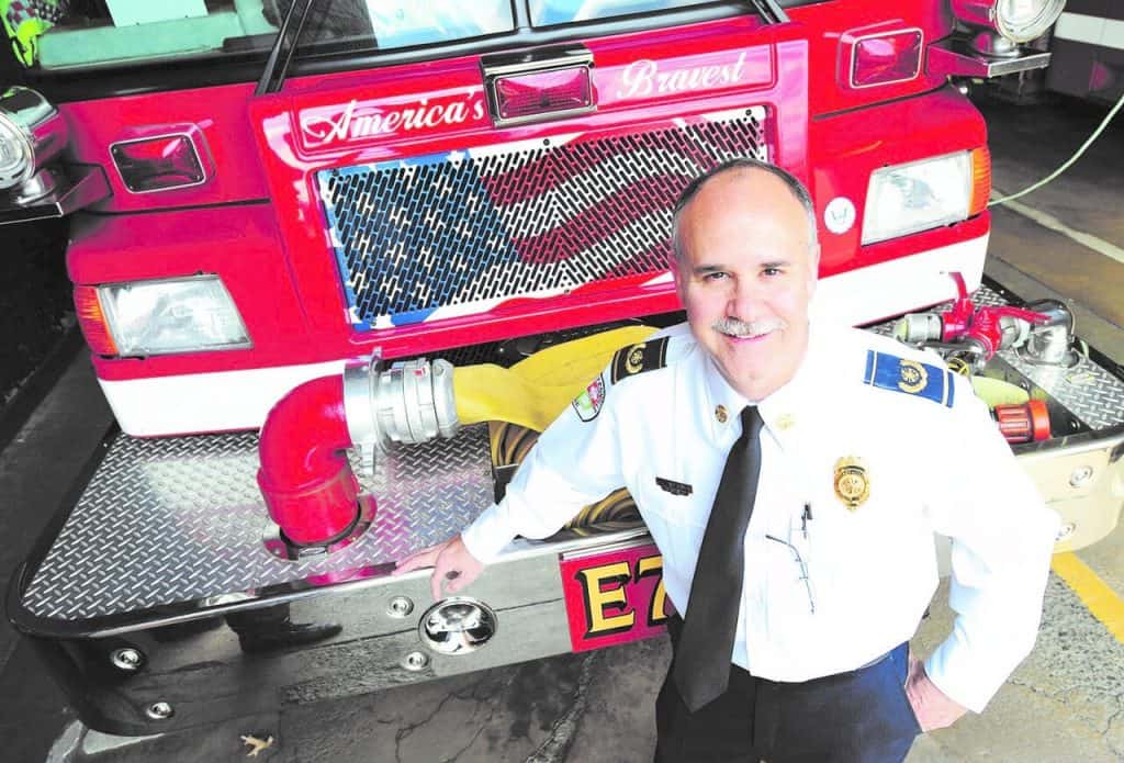 Portrait of Charles Werner Standing Near Fire Truck