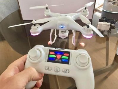 t25 drone remote control with screen isolated