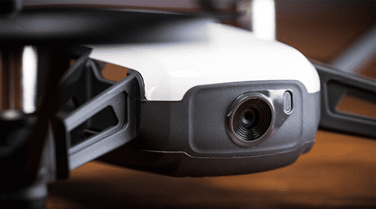 A full close-up on DJI Tello drone's camera while it's in idle state